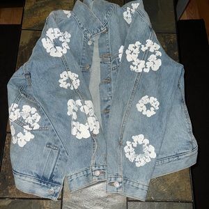 Stylish Blue Denim Jacket with White Floral Accents